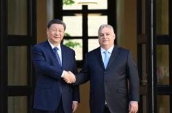 习近平致电祝贺默茨当选德国联邦总理